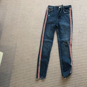 zara jeans with red and white stripe down the side
